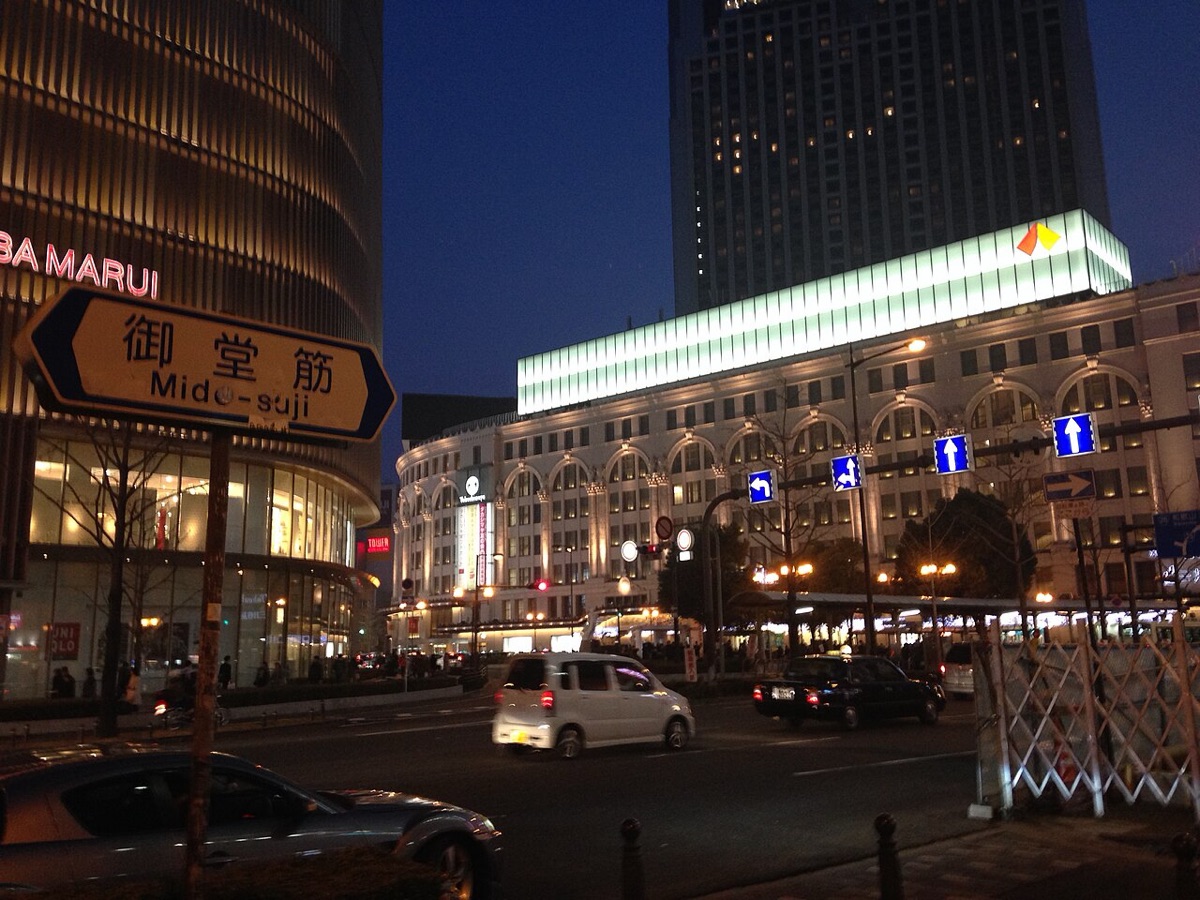 Midosuji Street illuminated at night near Namba